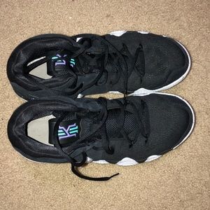 Kyrie Irving black and white basketball shoes